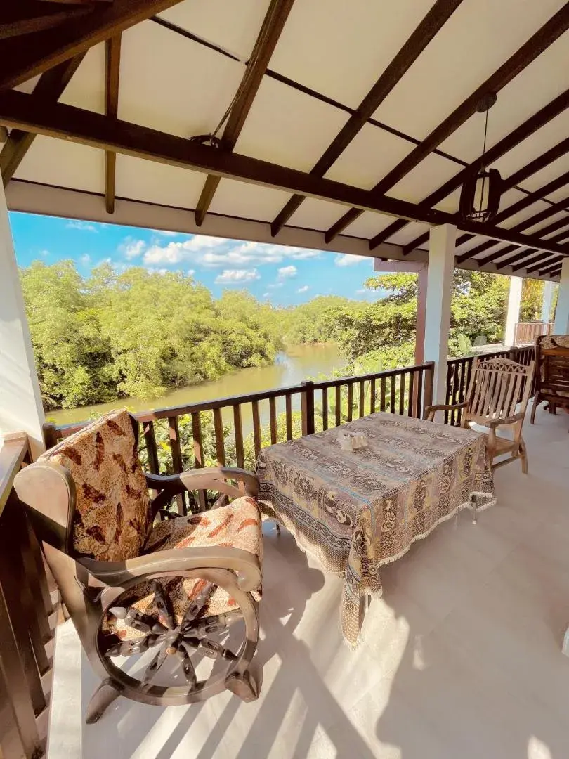 A quiet chair overlooking the Riverwood Villa landscape