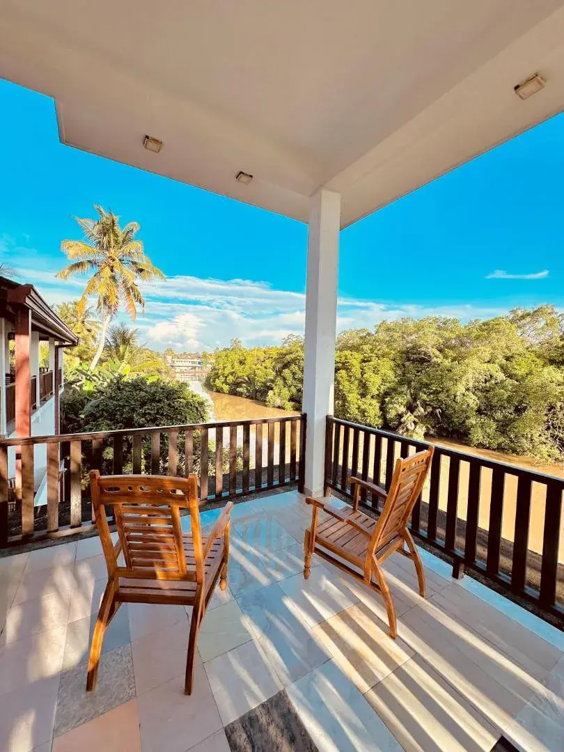 Balcony chairs overlooking the river