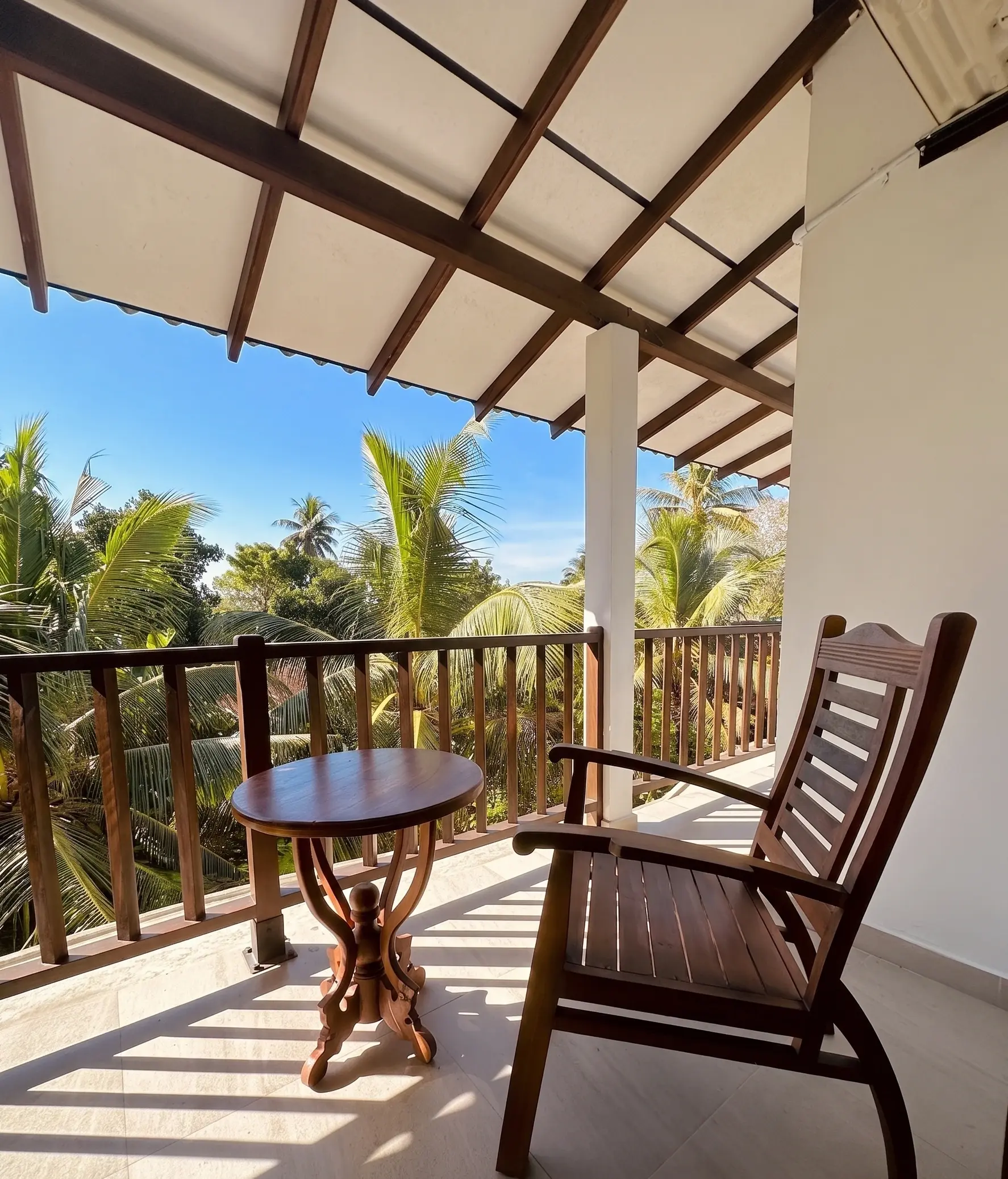 Morning palms seen from a Riverwood Villa balcony