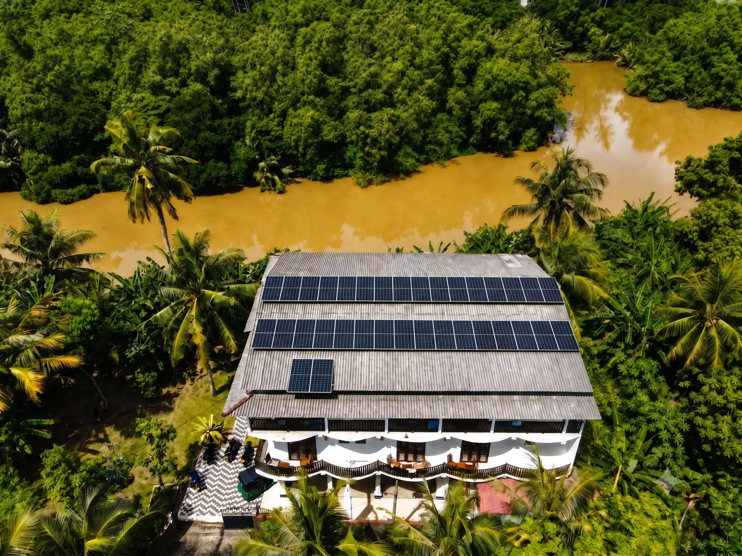 Aerial view of Riverwood Villa and the river landscape